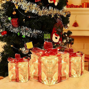 Comparativo de tamanho das três caixas de natal iluminadas